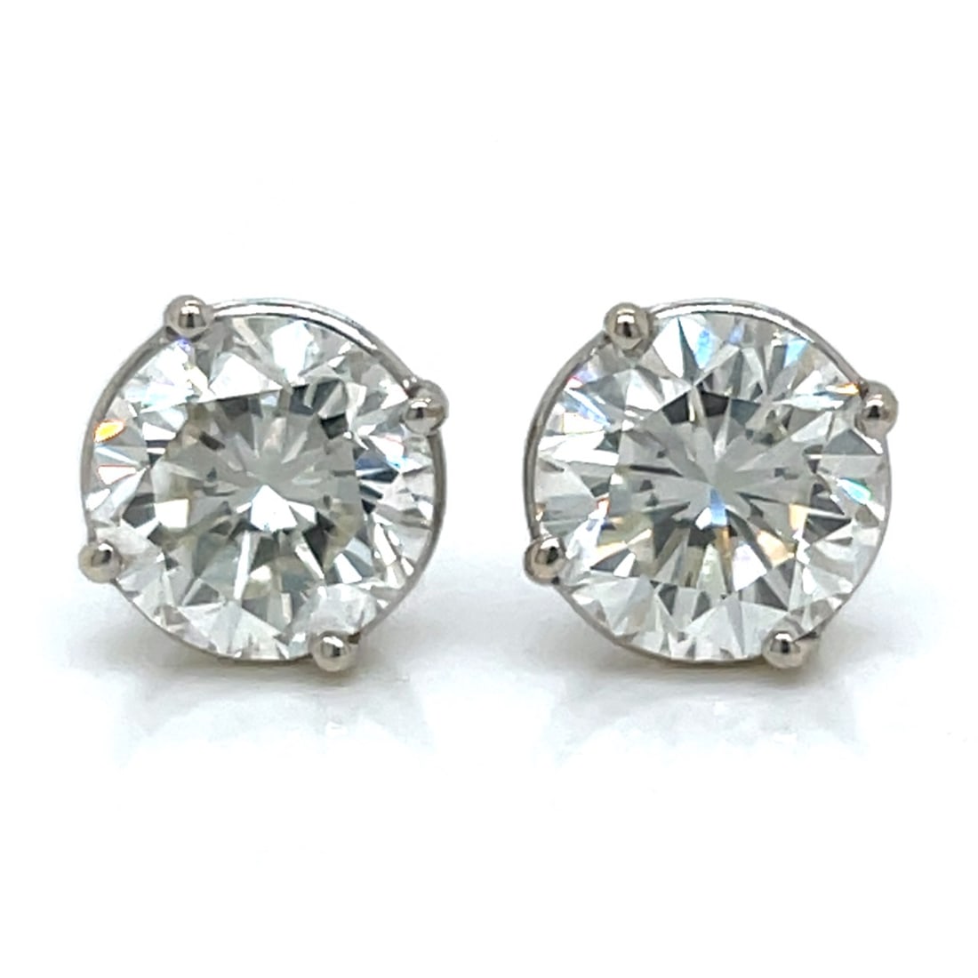 14K White Gold GIA Certified 6.09 Ct. Diamond Stud Earrings: 14K White Gold GIA Certified 6.09 Ct. Diamond Stud EarringsWeighing 4.0 gramsSet with:3.08 Ct. GIA Certified Round DiamondJ Color, SI1 Clarity8.88 – 8.98 x 5.92mmGIA #22357176573.01 Ct. GIA Cert