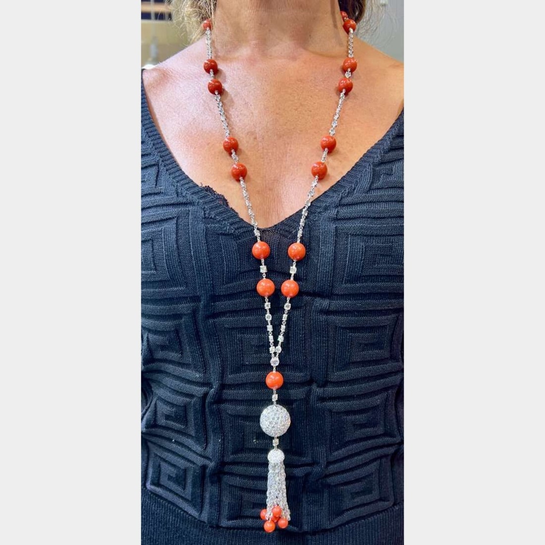 18K White Gold 70.00 Ct. Diamond & Coral Necklace: 18K White Gold 70.00 Ct. Diamond & Coral NecklaceWeighing 90.7 gramsSet with app. 70.00 Ct. of Briolette & Round DiamondsE-G Color, VVS-VS ClarityCORALApp. 38 inches in length