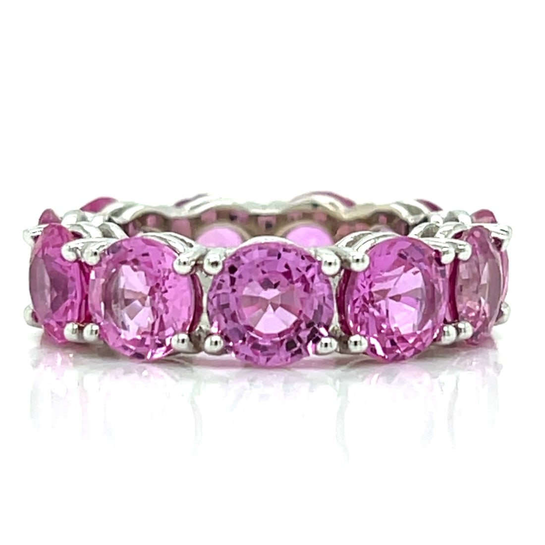 SCHREINER 18K White Gold GIA Certified Pink Sapphire Ring: SCHREINER 18K White Gold GIA Certified Pink Sapphire RingWeighing 10.1 gramsSet with 11 GIA Certified Pink Sapphires weighing 13.18 Ct.Ring Size 6.5