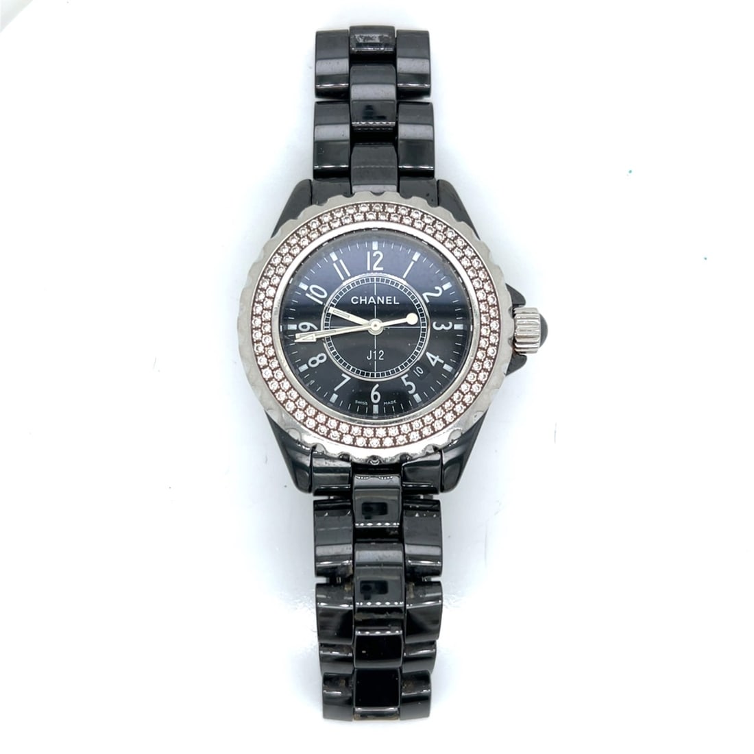 CHANEL Black Ceramic J-12 Ladies Watch: CHANEL Black Ceramic J-12 Ladies WatchWeighing 100.0 grams33mm CaseFactory diamond bezelQuartz movementFits 6.5 inch wrist