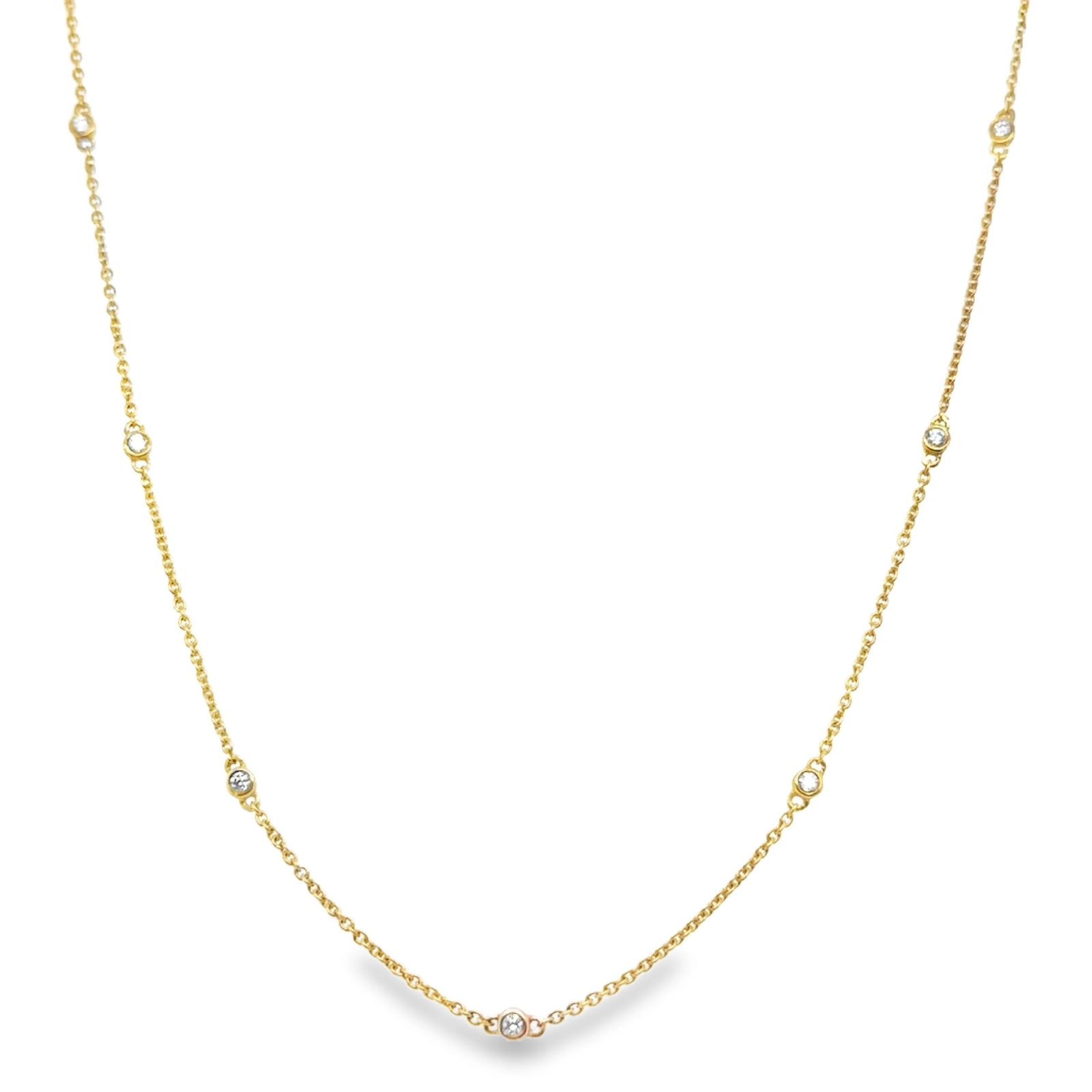14KT GOLD DIAMOND STATION NECKLACE: 14KT GOLD DIAMONDS BY THE YARD NECKLACE 16"14K GOLD WT APPROX. 2.25 GRAMDIAMOND WT. APPROX. 0.26 CARAT / 13 PCS16" LONG