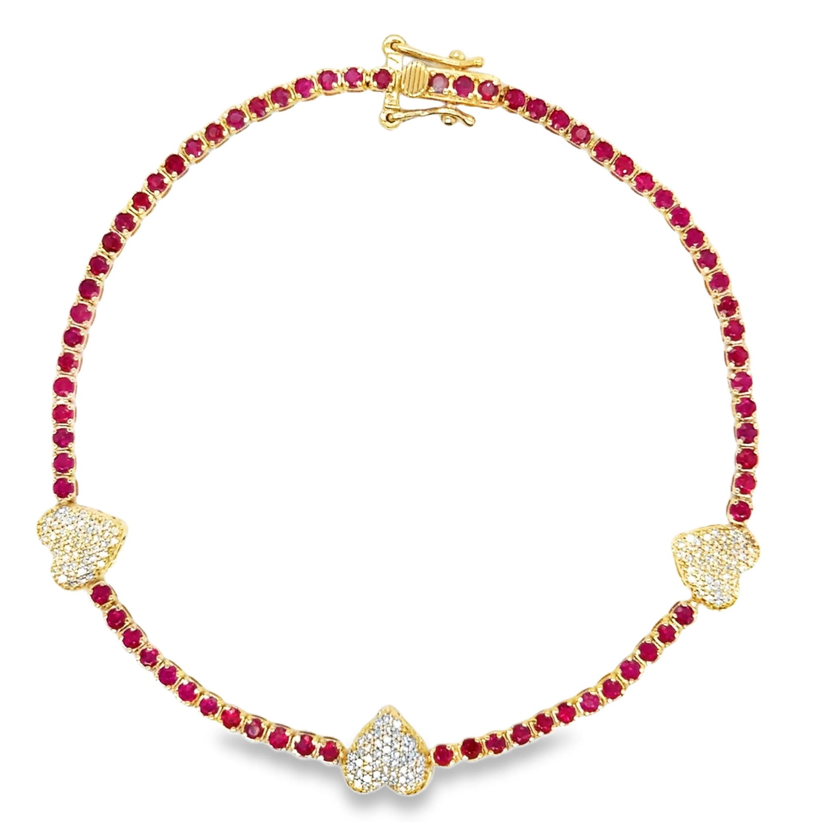 14KT GOLD RUBY AND DIAMONDS HEART TENNIS BRACELET: 14KT YELLOW GOLD RUBY AND DIAMONDS HEART TENNIS BRACELET 7"14KT GOLD WT. APPROX. 4.51 GRAMDIAMOND WT. APPROX. 0.26 CARAT / 147 PCSRUBY WT. APPROX. 1.87 CARAT / 72 PCS