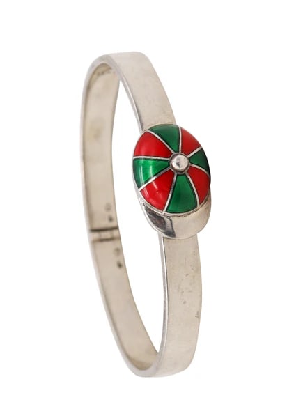 Gucci Milan 1970 Rare Equestrian Jockey Hat Cuff In .925 Sterling Silver With Red And Green Enamel: Enameled Jockey Hat cuff designed by Gucci.Very rare vintage Equestrian jockey Hat cuff created by the Gucci house in Milano, circa 1970's. This iconic elegant bracelet was crafted in solid .925/,999