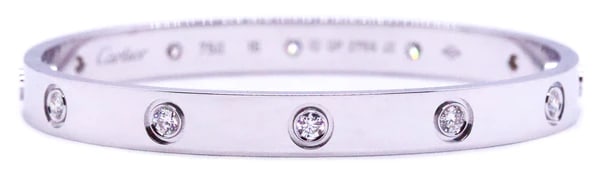 CARTIER LOVE BRACELET 10 DIAMONDS 18 KT WHITE GOLD SIZE 16 NIB WITH SCREWDRIVER: THE FAMOUS LOVE BRACELET CUFF CREATED IN NEW YORK BY THE ITALIAN DESIGNER ALDO CIPULLO FOR THE MAISON CARTIER IN THE EARLY 1969. TODAY IS ONE OF THE MOST CLASSIC AND ICONIC JEWELRY DESIGN OF HE 20th C