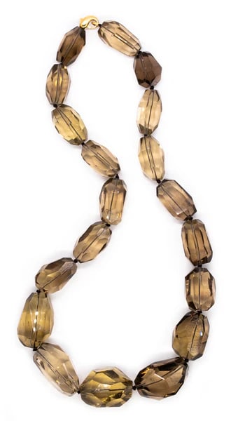 H. Stern 18Kt Gold Massive Necklace With 2550 Ctw In Faceted Greenish Smokey Quartz: An statement necklace designed by H. Stern.Very modern and massive piece designed by the Brazilian jewelry house of H. Stern. Is composed by 19 oversized faceted beads of natural Brazilian Greenish-Sm