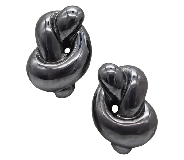 TIFFANY & CO. 1978 By Angela Cummings Knots Earrings in 18Kt Yellow Gold: Knots earrings designed by Angela Cummings for Tiffany & Co.This is a gorgeous pair of clips-on earrings created in New York City by Angela Cummings for Tiffany & Co. back in the 1978. They has been c