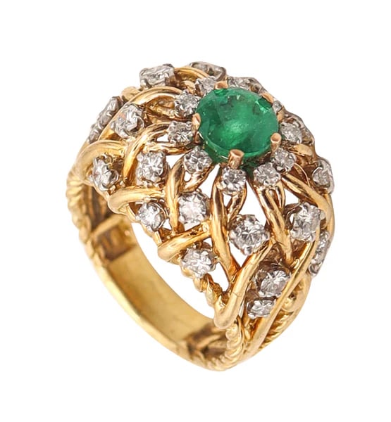 TIFFANY & CO. 1960 Cocktail Ring In 18Kt Gold With 2.89 Ctw Emerald And Diamonds: Bombe cocktail ring designed by Tiffany & Co.This is a fantastic bombe cocktail ring created in New York City by the jewelry house of Tiffany & Co., back in the 1960. The ring has been crafted as a hi