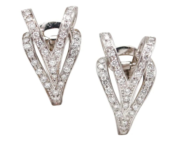 MARINA B. "Bvlgari" Milano Clips On Earrings In 18Kt White Gold With VS Diamonds: Pair of clips-on earrings designed by Marina B.This pair of clips-on earrings were created in Milano Italy by the jewelry house of Marina B., back in the 2000 and 2010. The beautiful pair of earrings