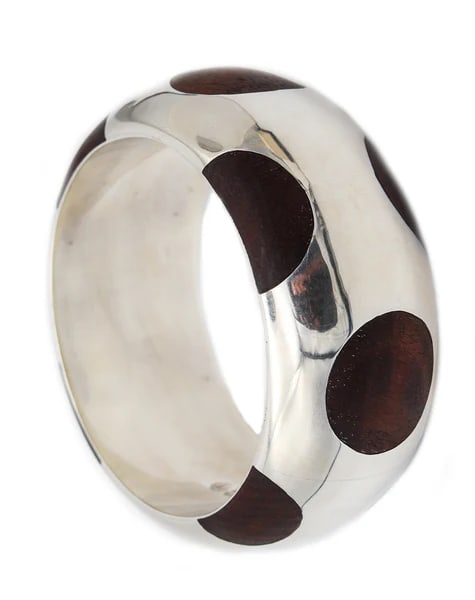 MEXICO 1970 Taxco Modernist Bangle In .925 Sterling Silver With Carved Woods: A Mexican modernist sculptural bangle bracelet.This is a fabulous sculptural bangle bracelet created in the silver-city of Taxco in Mexico, back in the 1970's. This sliding wrist-arm bracelet has a go