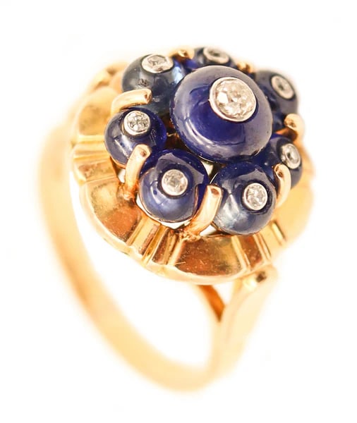 CARTIER PARIS 1960 Cocktail Ring In 18Kt Yellow Gold With Diamonds & Sapphires: A cocktail ring with sapphires designed by Cartier.This is a beautiful and very rare vintage cocktail ring created in Paris France by the jewelry house of Cartier, between the 1955 and 1960. This fabu