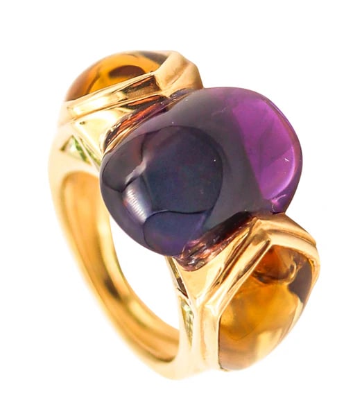 MARINA B. Modernist Lion Cocktail Ring In 18Kt Yellow Gold With Amethyst & Citrines: Lion cocktail ring designed by Marina B. (1930-2024).This is an extremely rare colorful cocktail ring created in Milano Italy by the iconic designer Marina Bvlgari, back in the 1986. This beautiful vi