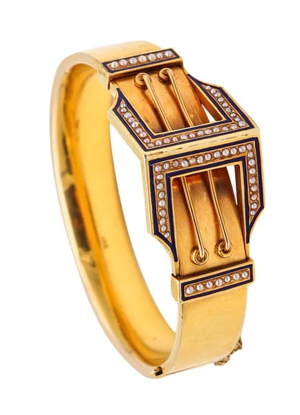 Victorian 1870 Etruscan Revival Geometric Bracelet In 16K With Enamel And Pearls: Victorian Etruscan Revival bracelet.An outstanding classic bracelet, created in England during the Victorian Era (1837-1901), circa 1870. This bangle bracelet has been carefully crafted in solid yello