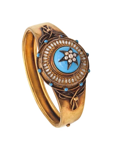 Victorian 1870 Etruscan Revival Celestial Star Bangle Bracelet In 15Kt Gold With Pearls: Victorian Etruscan Revival celestial star bracelet.Very rare bracelet of a celestial star highly decorated, created in England during the Victorian Era (1837-1901), back in the 1870 This fabulous bang