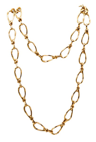 French 1970 Modernist Twisted Links Long Sautoir Chain In 18 Kt Yellow Gold: Modernist twisted links necklace sautoir made in France.A very unusual long necklace sautoir, created in Paris France back in the 1970. This necklace chain, was crafted with modernist patterns and is
