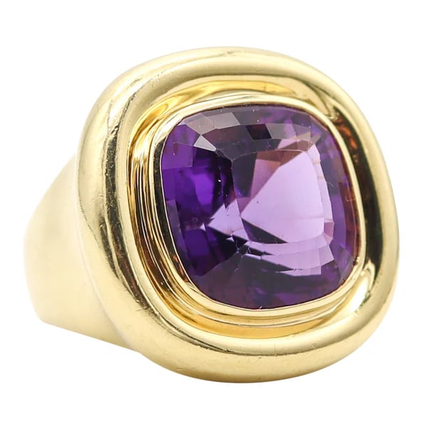 TIFFANY & CO. 1985 Paloma Picasso Square Cocktail Ring In 18Kt Gold & Amethyst: Square cocktail ring designed by Paloma Picasso for Tiffany & Co.This vintage cocktail ring was created by Paloma Picasso for Tiffany & Co. back in the 1985. The sculptural bold ring is the largest ve
