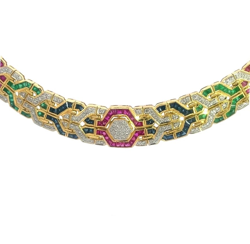 Diamond & Gems Gold Necklace 18k Yellow Collar Panther Links 3 Rows: The product is a stunning 18k yellow gold necklace featuring a collar style with a 5.5 inches long curved shape centerpiece showcasing a unique graduated design, larger from the center with channel se