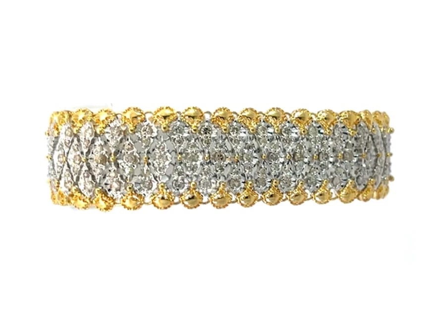 Diamond Gold Bracelet 18k Two Tone Soft Flex Link Style: This lovely diamond gold bracelet is a fine piece of jewelry, it features an 18k yellow and white gold bracelet with the white gold marquise links accented with diamonds in the center and yellow gold