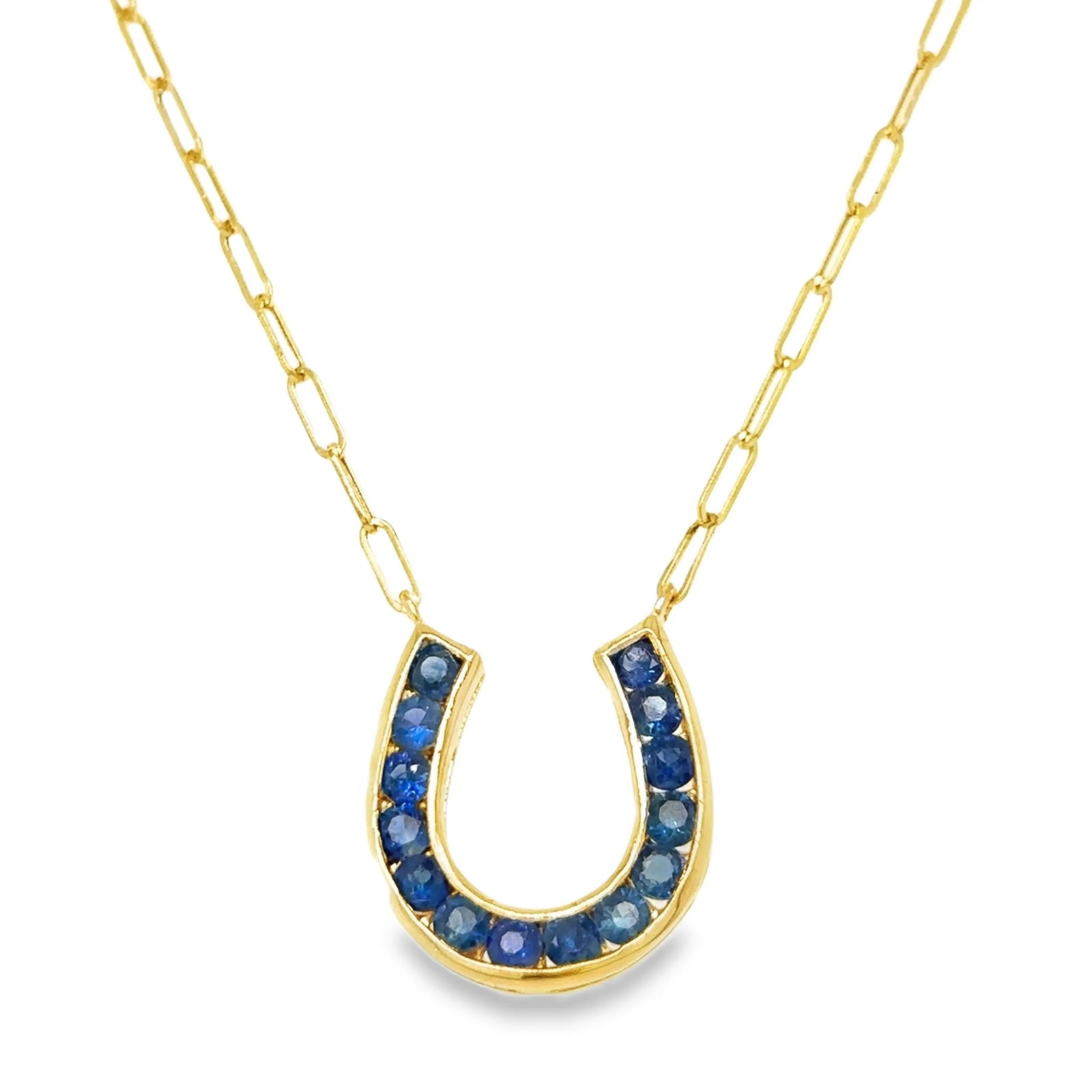 14KT YELLOW GOLD BLUE SAPPHIRE HORSESHOE NECKLACE: 14KT YELLOW GOLD BLUE SAPPHIRE HORSESHOE NECKLACE14KT. GOLD WT. APPROX. 3.90 GRAMSTONE: BLUE SAPPHIRESTONE WT. APPROX. 1.93 CARAT/ 14 PCS18 INCH LONG