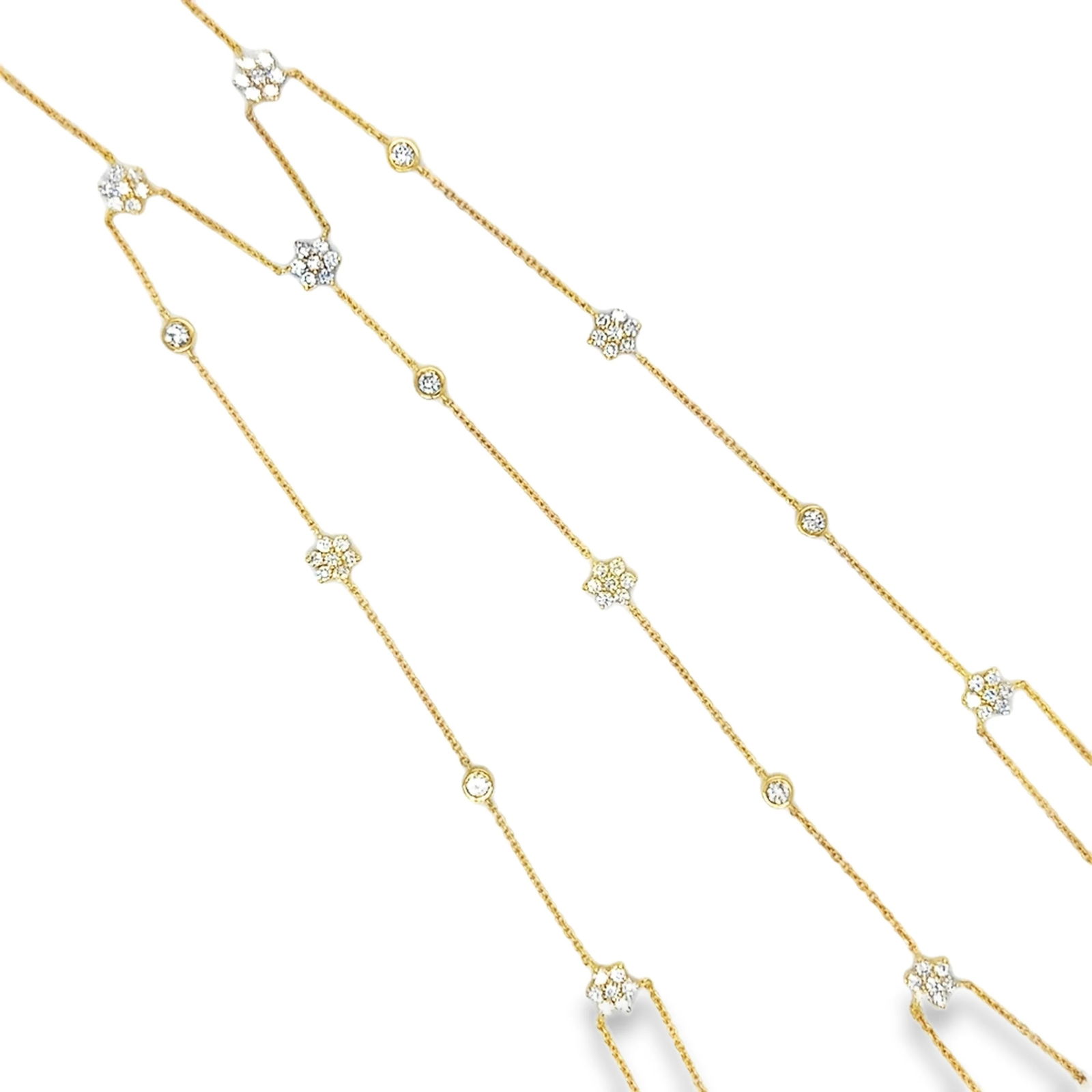 14KT YELLOW GOLD DIAMONDS HAND CHAIN: 14KT YELLOW GOLD DIAMONDS HAND CHAIN14KT GOLD WT. APPROX. 3.85 GRAMDIAMOND WT. APPROX. 1.06 CARAT/ 69 PCSWRIST TO FINGER LENGTH APPROX. 3.5 INCHES LONGWRIST LENGTH APPROX. 7 INCHES LONG (6.5 INCHES TO