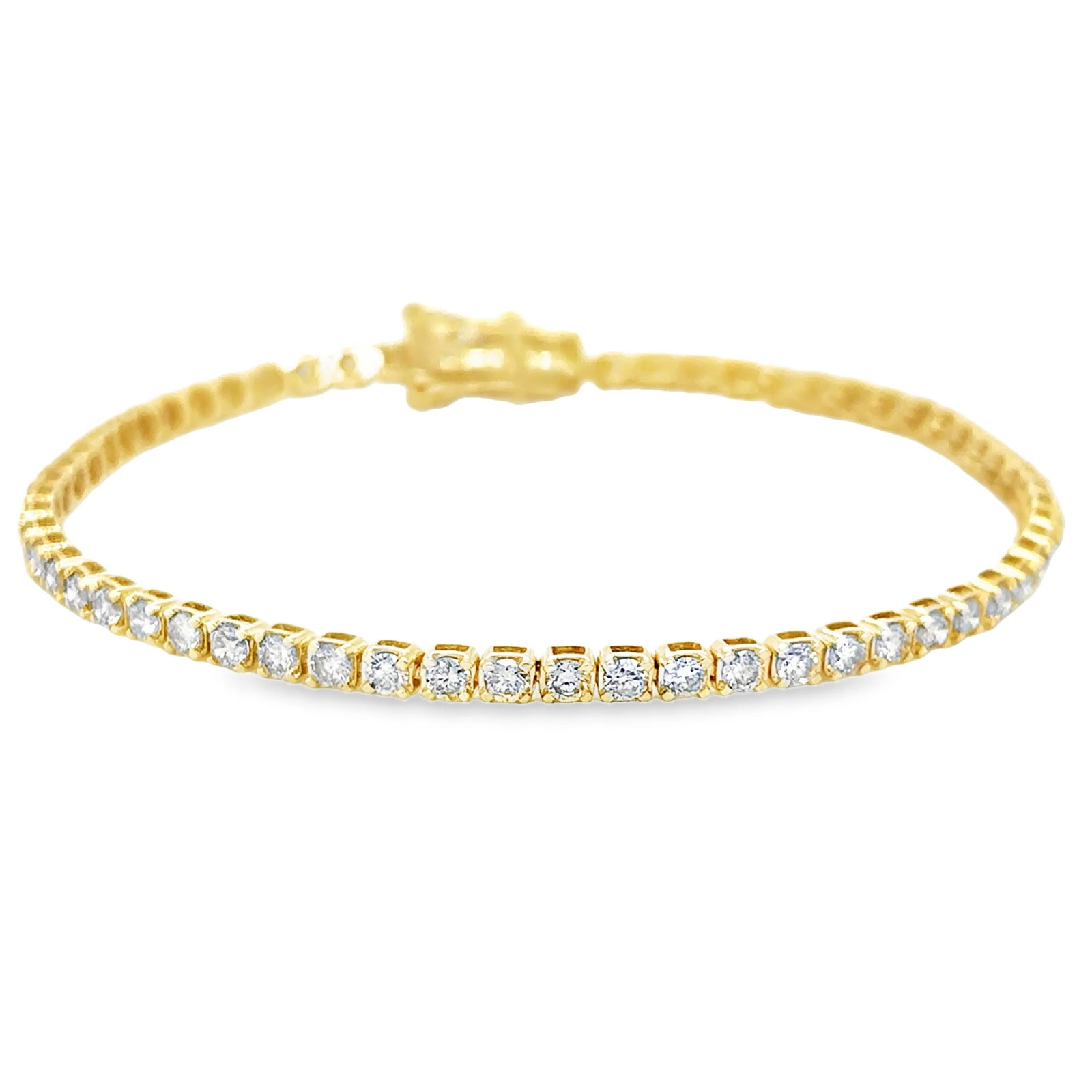 14KT GOLD CHAMPAGNE DIAMONDS TENNIS BRACELET: 14KT GOLD DIAMONDS TENNIS BRACELET 7"14KT GOLD WT. APPROX. 2.80 GRAMDIAMOND WT. APPROX. 1.00 CARAT / 108 PCSSIZE APPROX. - 1.50 MM (WITH MOUNTING)