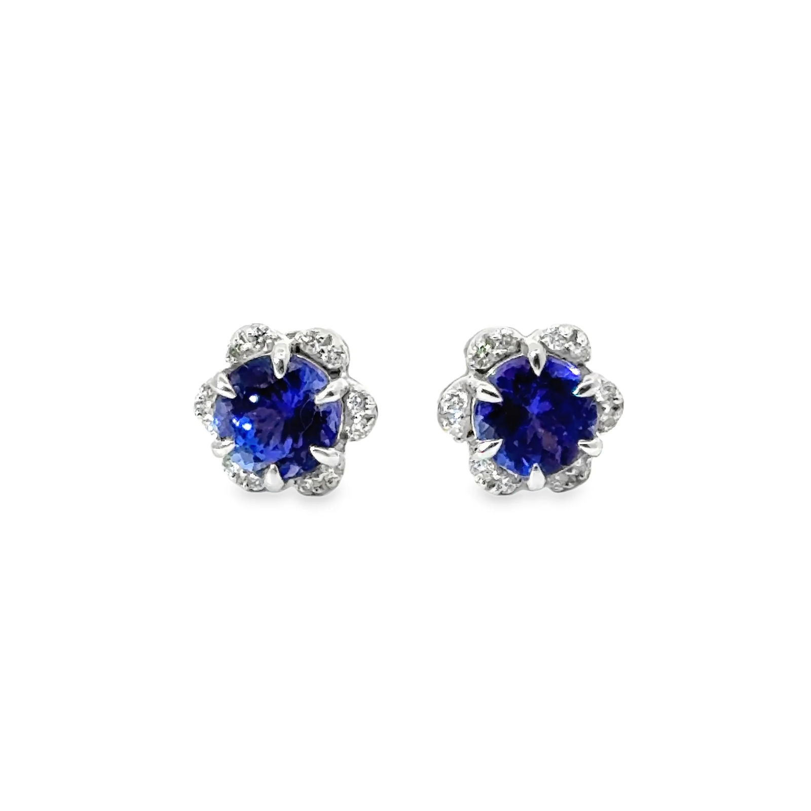 14KT GOLD TANZANITE AND DIAMONDS STUD EARRING: 14KT GOLD TANZANITE AND DIAMONDS STUD EARRING14KT GOLD WT. APPROX. 1.73 GRAMDIAMOND WT. APPROX. 0.13 CARAT / 24 PCSTANZANITE WT. APPROX. 1.53 CARAT / 2 PCSIZE APPROX. 7.5 X 7.5 MM