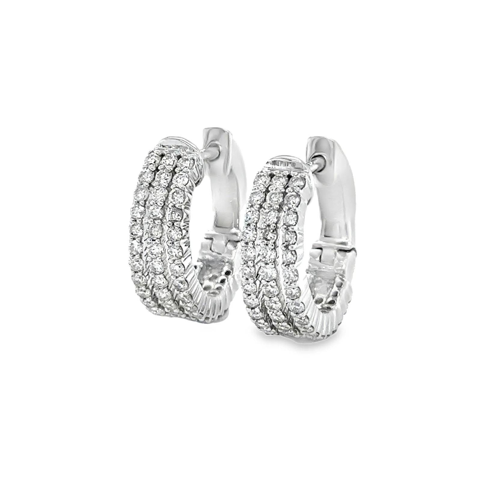 14KT WHITE GOLD DIAMONDS HUGGIES: 14KT WHITE GOLD DIAMONDS HUGGIES 14KT GOLD WT. APPROX. 5.68 GRAMDIAMOND WT. APPROX. 1.08 CARAT/ 102 PCSSIZE APPROX. 16.5 MM WIDTH: 5 MM