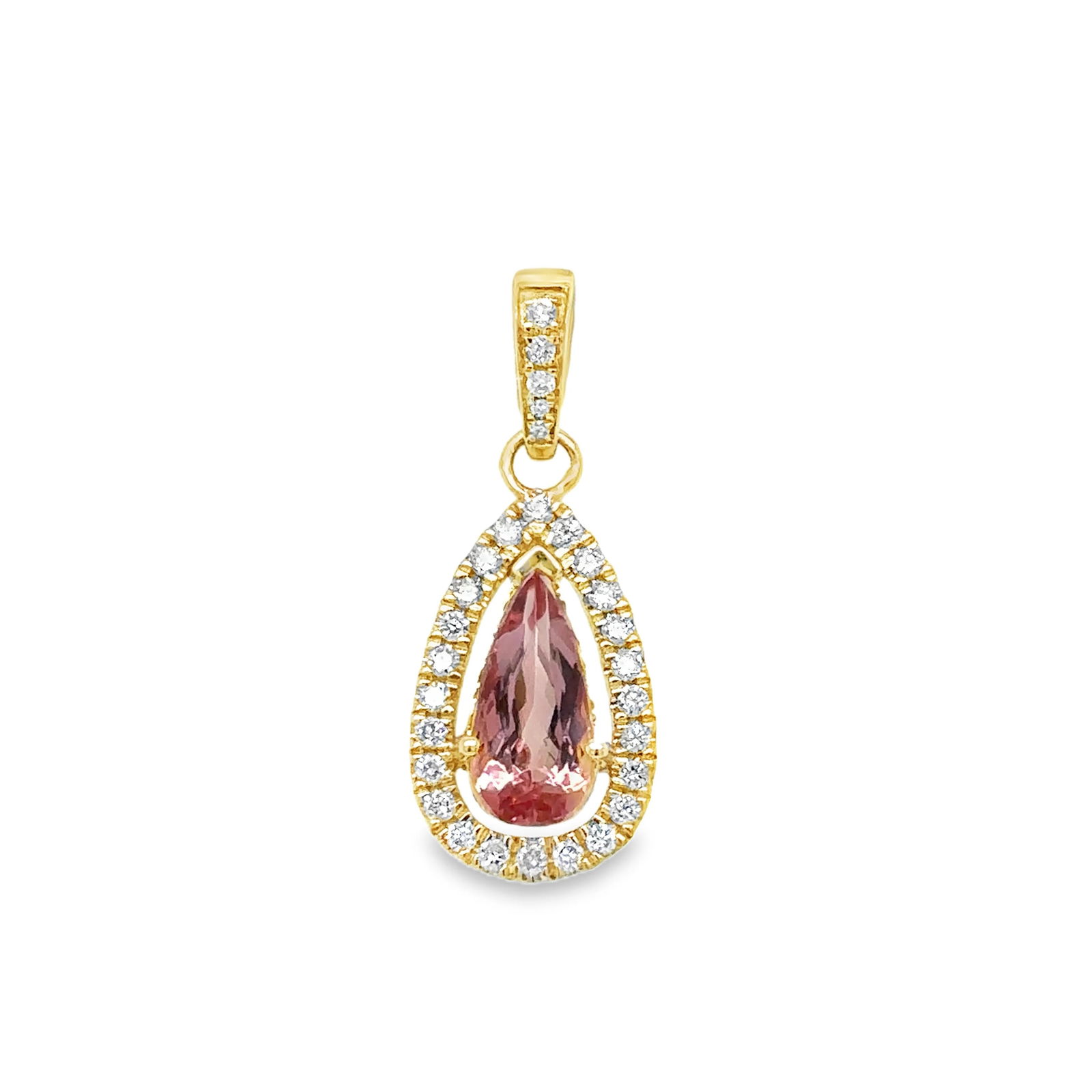 14KT GOLD TOPAZ AND DIAMONDS PENDANT: 14KT GOLD TOPAZ AND DIAMONDS PENDANT14KT GOLD WT. APPROX. 1.54 GRAMDIAMOND WT. APPROX. 0.22 CARAT / 29 PCSTOPAZ WT. APPROX. 1.33 CARATSIZE: 9.5 X 15 MM WITHOUT LOOP