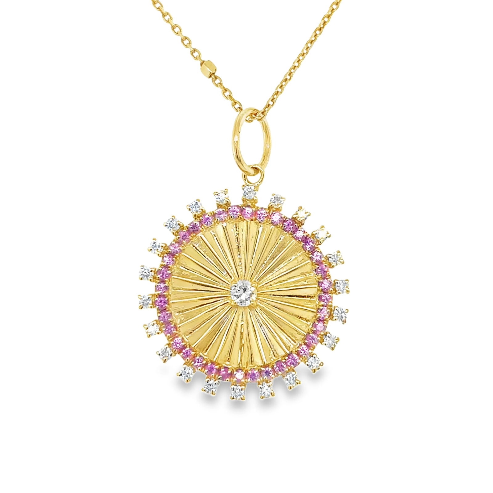 14K YELLOW GOLD DIAMOND AND PINK SAPPHIRE CIRCLE PENDANT: 14K YELLOW GOLD DIAMOND AND PINK SAPPHIRE CIRCLE PENDANT WITHOUT CHAIN14KT. YELLOW GOLD WT. APPROX. 2.30 GRAMDIAMOND WT. APPROX. 0.35 CTSPINK SAPPHIRE WT. APPROX. 0.47 CTSSIZE: APPROX. 22 MM