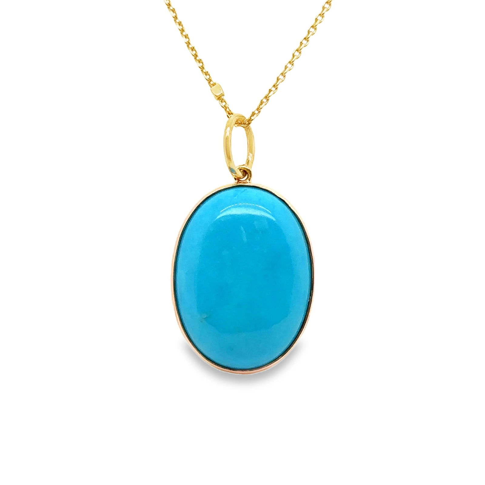14KT YELLOW GOLD TURQUOISE OVAL PENDENT: 14KT YELLOW GOLD TURQUOISE OVAL PENDENT 14KT GOLD WT. APPROX. 1.15 GRAMSTURQUOISE WT. APPROX. 14.70 CARATS/ 01 PCSIZE APPROX. 15.5 MM X 20 MMTHICKNESS: 6 MM