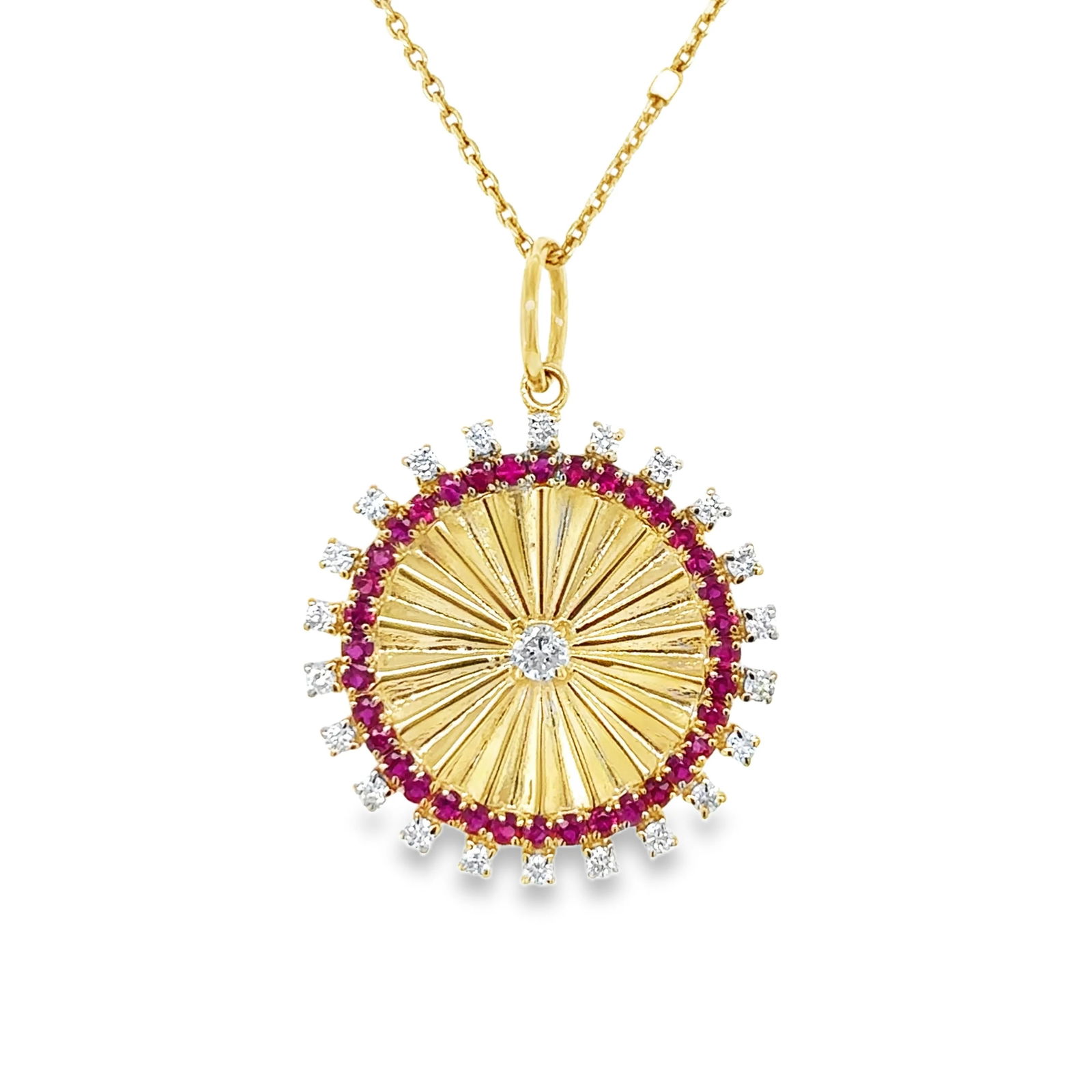 14K YELLOW GOLD DIAMOND AND RUBY CIRCLE PENDANT: 14K YELLOW GOLD DIAMOND AND RUBY CIRCLE PENDANT WITHOUT CHAIN14KT. YELLOW GOLD WT. APPROX. 2.30 GRAMDIAMOND WT. APPROX. 0.35 CT/ 23 PCSRUBY WT. APPROX. 0.47 CTSSIZE: APPROX. 22 MM (WITHOUT