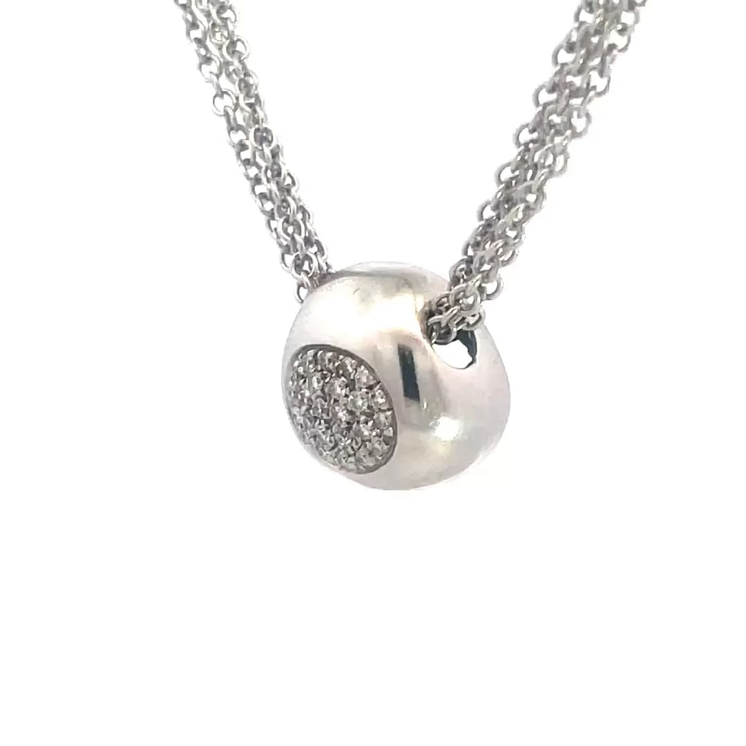 Leo Pizzo Diamond Gold Necklace 18k White Pave Set Slide Charm Multi-Chain: This charming Leo Pizzo necklace is a luxurious piece of fine jewelry that features an odd shaped hallow ball slide charm strung through 4 strands of chain, the front has paved set diamonds. The neckl