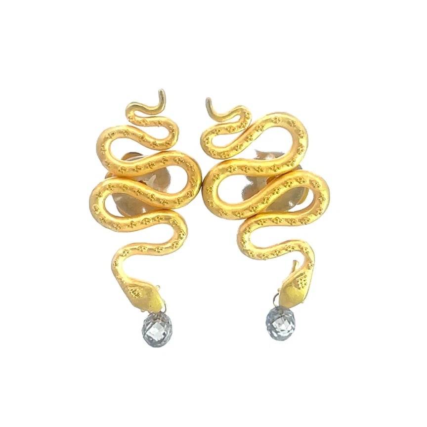 Diamond Gold Snake Earrings 18k Yellow Bead Design Briolette Cut: This charming pair of earrings are crafted from 18k yellow gold featuring a full-length snake design with fine bead work with its head at the end of the earring and a briolette cut champagne diamond h