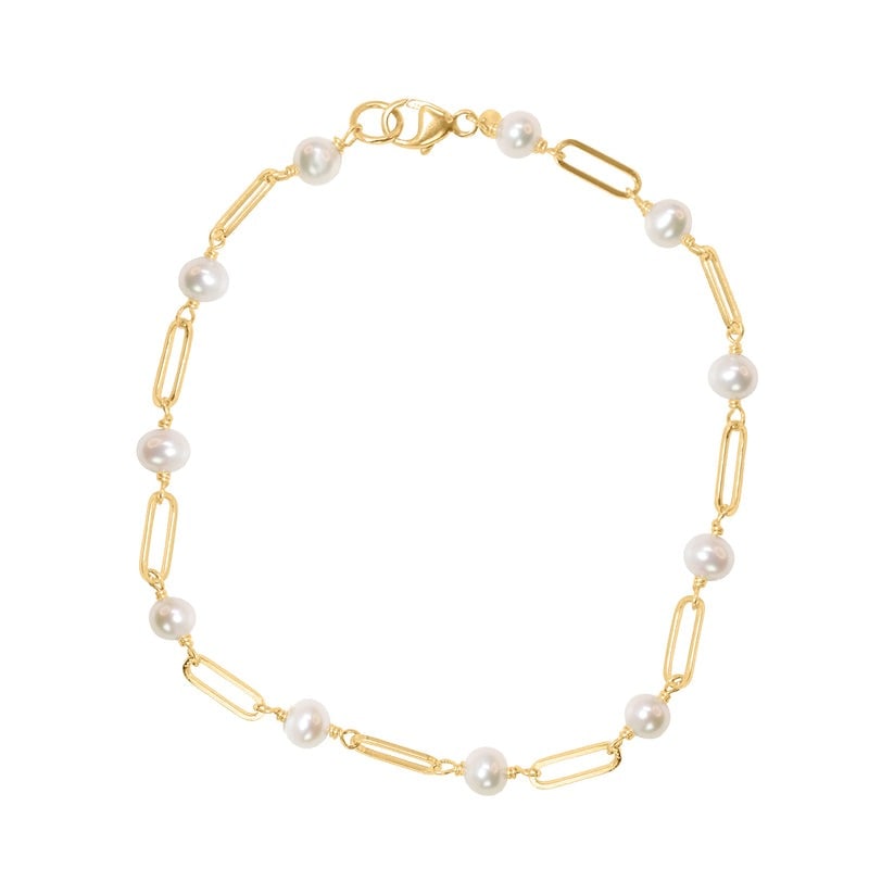14k White Pearl Paperclip Bracelet: Wrap yourself in the timeless beauty of this 14k yellow gold paperclip bracelet. Gorgeous White Freshwater Pearls adorn the chain, adding a touch of sophistication. Perfectly designed with a 7.5" leng