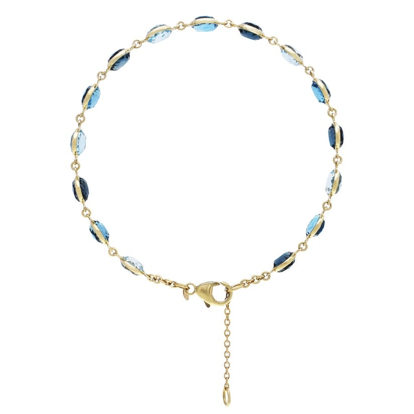 14k Multi-Color Blue Topaz Link Bracelet: High-polished 14-karat yellow gold 15 link bracelet perfectly set with multi-color Blue Topaz. Sensitive-skin friendly and won't tarnish.Exceptional Gemstones, Each gemstone is carefully selected and