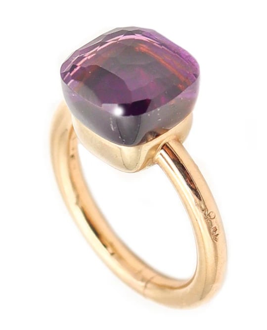POMELLATO Milan Nudo Ring In 18Kt Yellow Gold With 6.45 Cwt. Amethyst: Nudo ring designed by PomellatoThis the iconic Nudo ring created in Milano Italy by the prestigious jewelry house of Pomellato. This artistic ring has been carefully crafted in solid yellow gold of 18