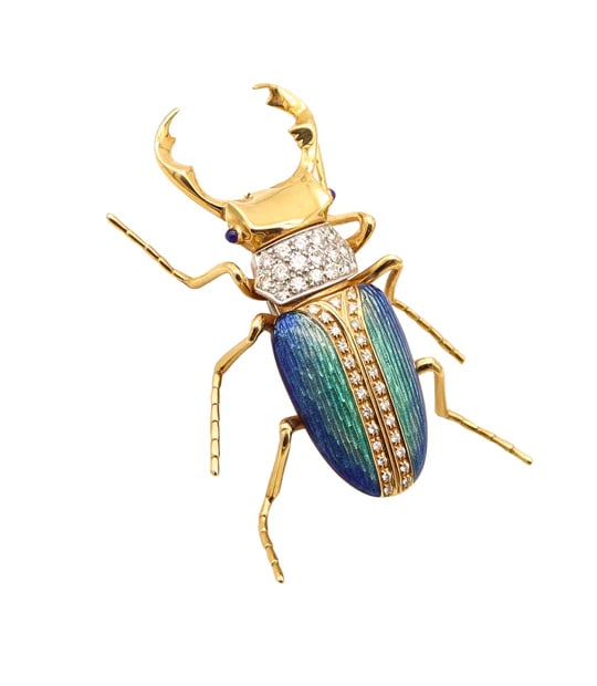 An enameled scarab brooch designed by Tiffany & Co.: An enameled scarab brooch designed by Tiffany & Co.This is a fabulous and extremely rare brooch with gorgeous eye appeal created in New York City by the American jewelry house of Tiffany & Co, back in