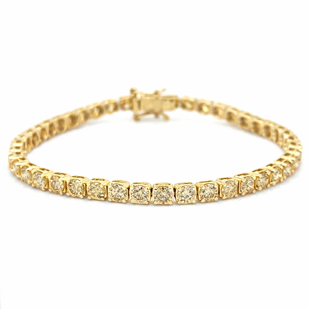 14KT GOLD CHAMPAGNE DIAMONDS TENNIS BRACELET 10.00 CTS: 14KT GOLD CHAMPAGNE DIAMONDS TENNIS BRACELET 7"14KT GOLD WT. APPROX. 10.36 GRAMDIAMOND WT. APPROX. 10.00 CARAT / 38 PCS