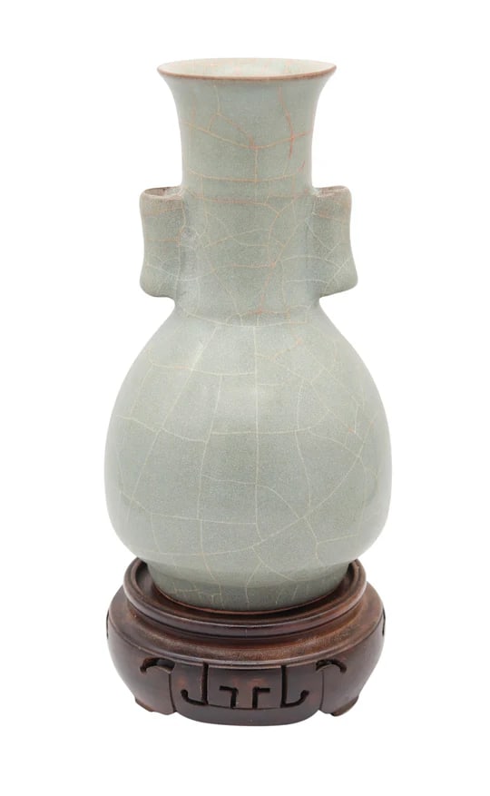 CHINA Song Dynasty 960-1279 AD Celadon Glazed Vase With Cylinder Handles: A celadon vase from the Song Dynasty.This is a genuine ancient vase created during the Song Dynasty in China. Long Quan ware celadon glazed vase with long neck and two tubular ears showing beautiful c