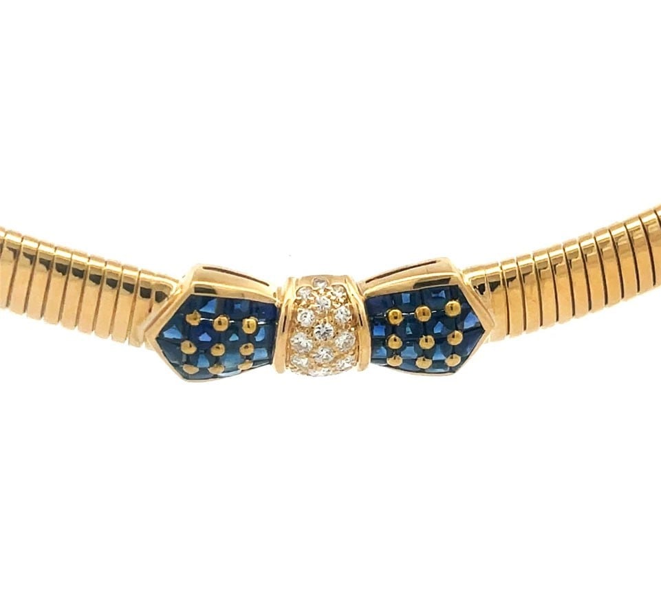 Tiffany & Co. Diamond Gold Necklace 18k Yellow Gem Bow Omega Style France: This gorgeous vintage choker necklace is from Tiffany & Co. France, it is an eye-catching fine vintage jewelry featuring a 9mm wide omega chocker style necklace with a lovely bow design on the front c