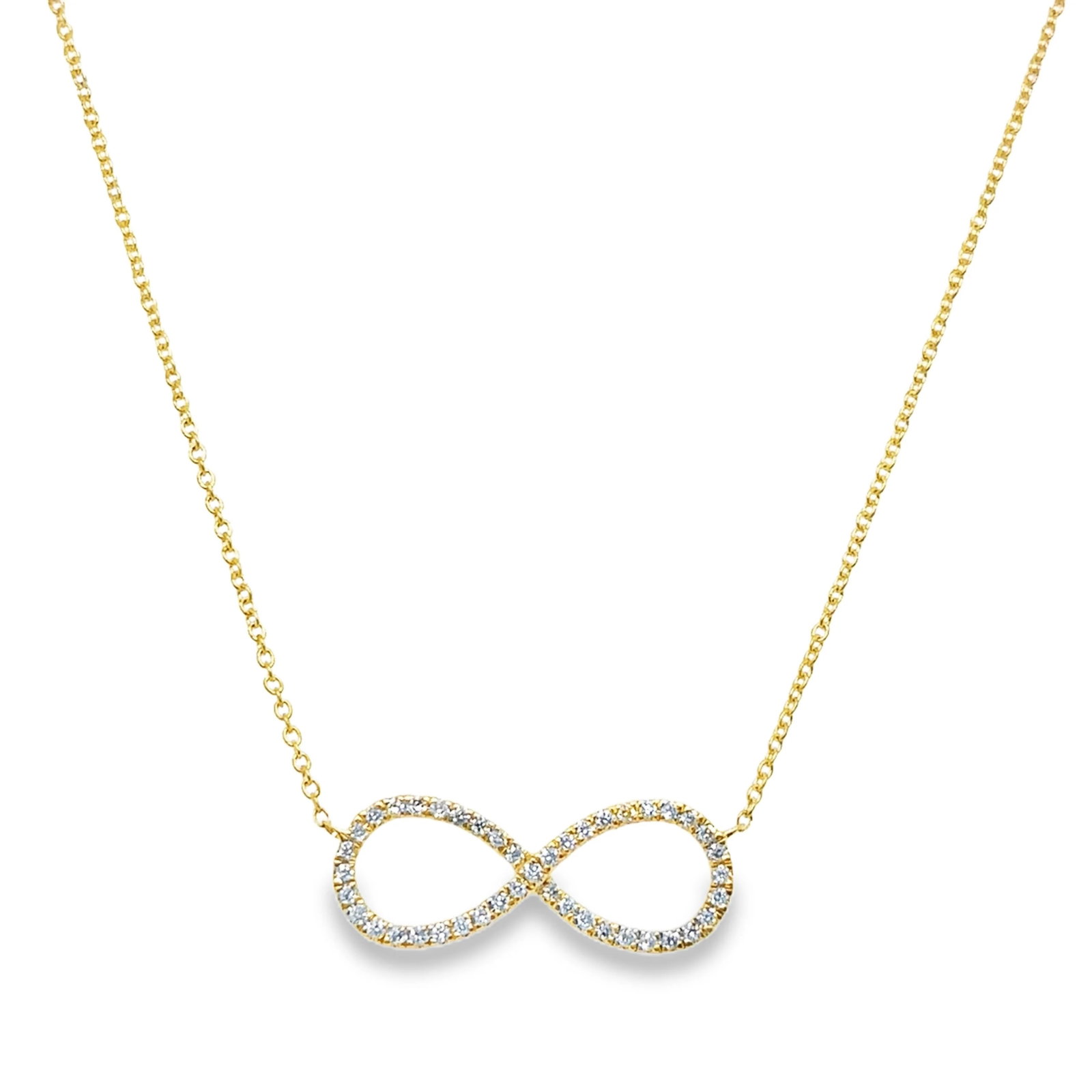 18KT GOLD DIAMOND INFINITY NECKLACE: 18KT YELLOW GOLD DIAMOND INFINITY NECKLACE 18"18KT GOLD WT. APPROX 2.81GRAMDIAMOND WT. APPROX. 0.21 CARAT/ 43 PCS18" LONG CHAIN WITH ADJUSTABLE RING ON 16" & 17" EXTENDER