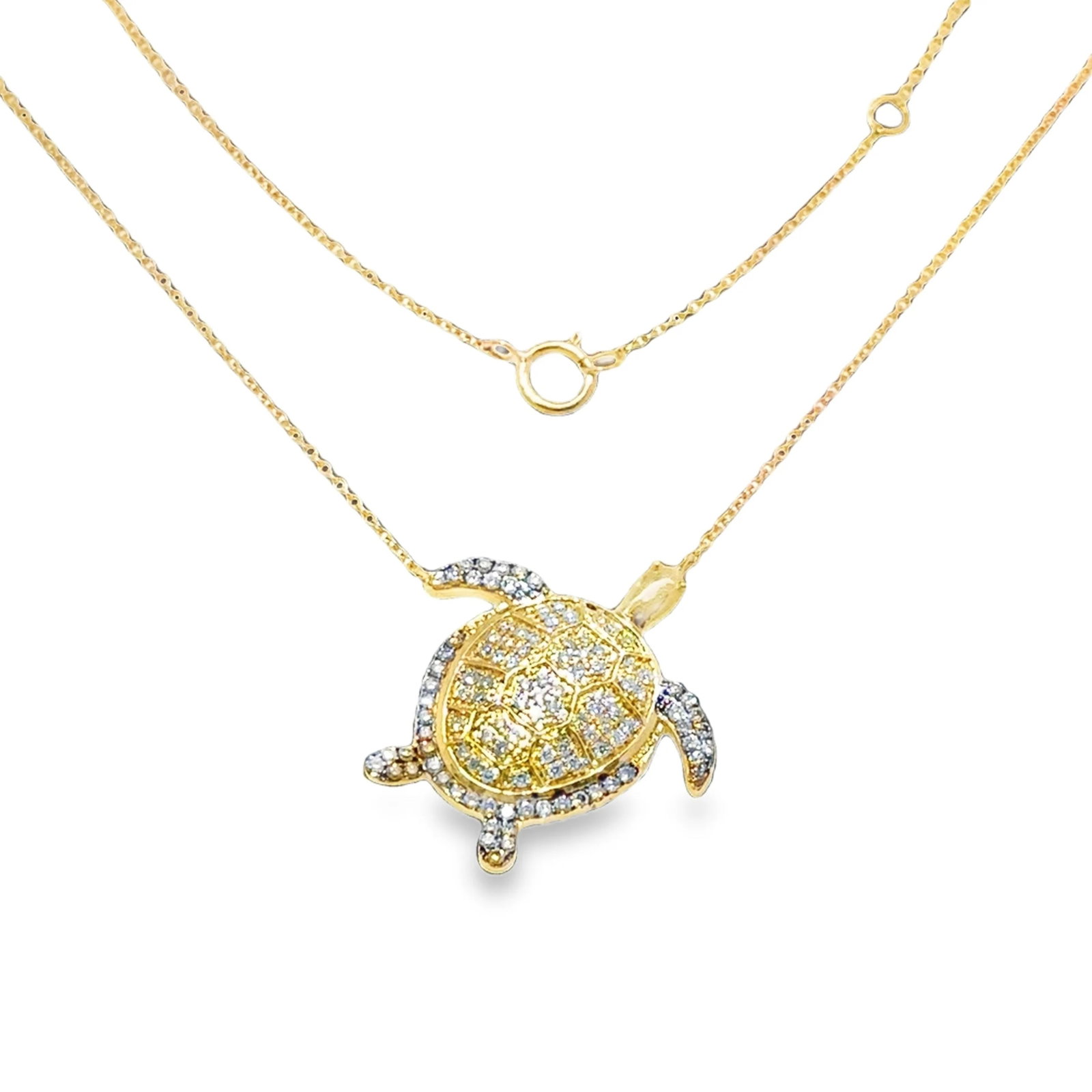 14KT YELLOW GOLD BROWN DIAMOND TURTLE NECKLACE: 14KT YELLOW GOLD BROWN AND WHITE DIAMOND TURTLE NECKLACE 18"14KT GOLD WT. APPROX.3.66 GRAMDIAMOND WT APPROX. 0.22 CARAT / 60 PCSBROWN DIAMOND WT. APPROX. 0.24 CARAT18" LONG CHAIN WITH ADJUSTABLE RING