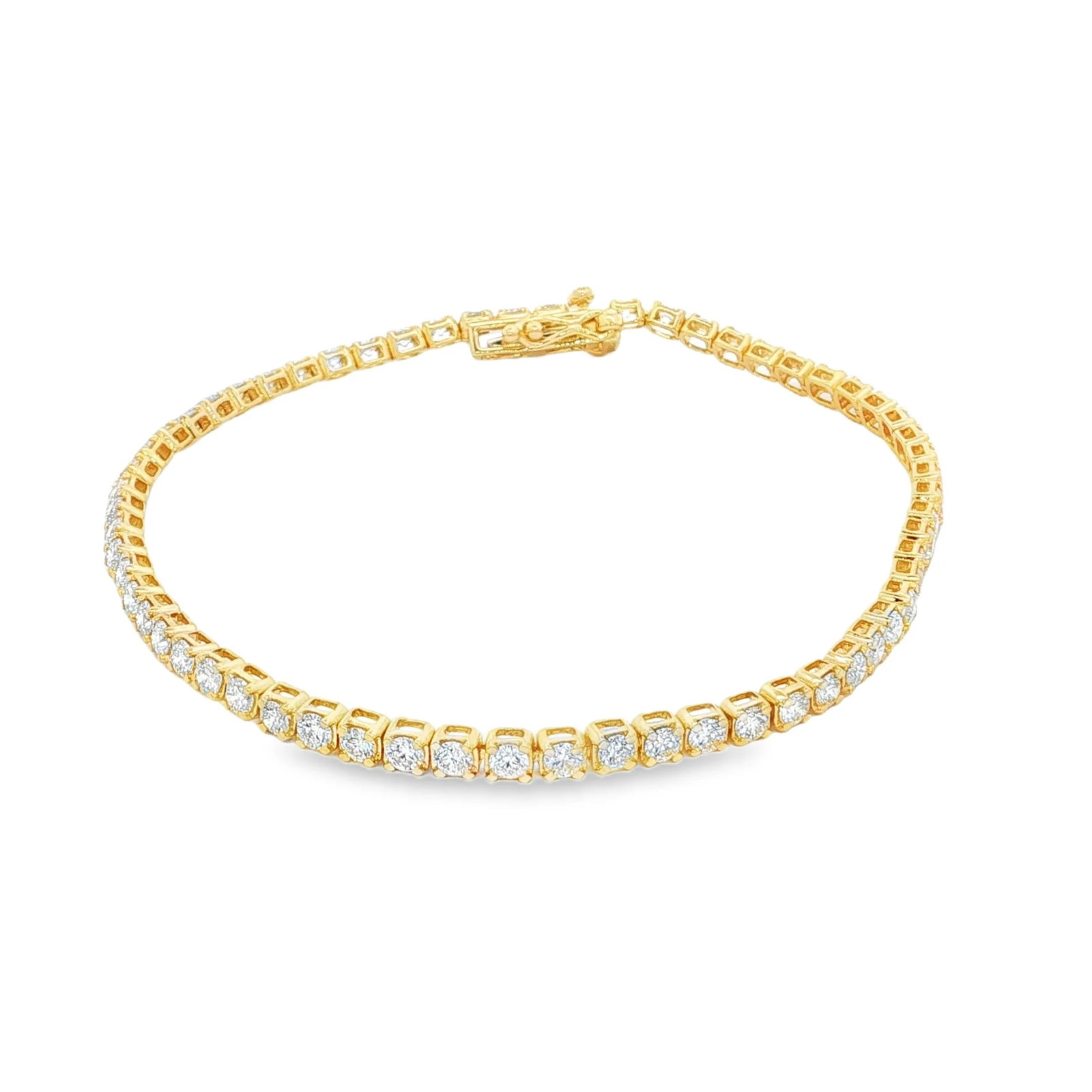 14KT YELLOW GOLD DIAMONDS TENNIS BRACELET (3.00 CTS): 14KT YELLOW GOLD DIAMONDS TENNIS BRACELET 7"14KT GOLD WT. APPROX. 5.98 GRAMDIAMOND WT. APPROX. 3.03 CARAT / 61 PCS
