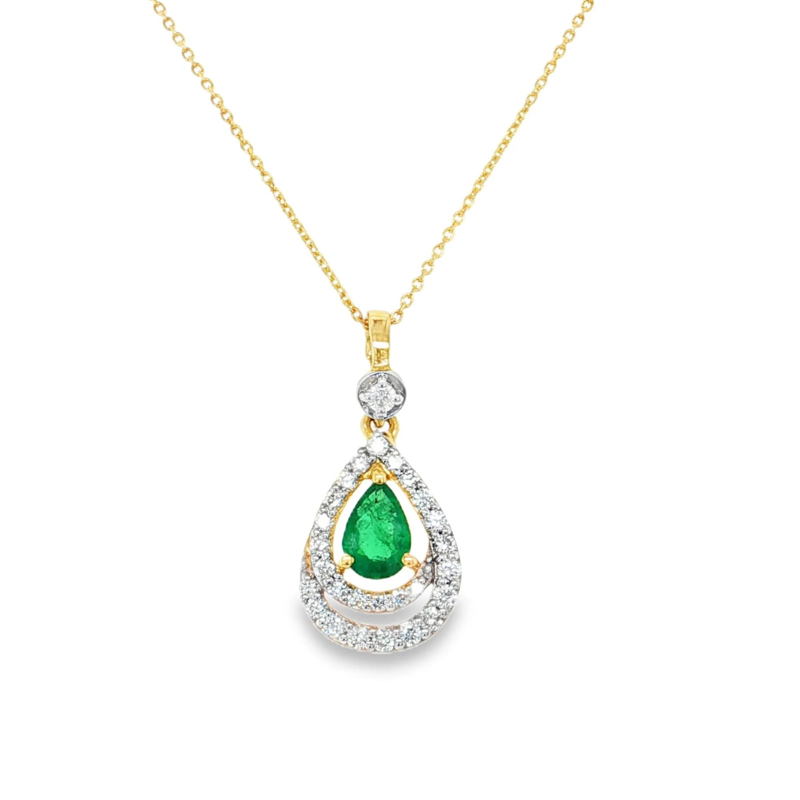 14KT YELLOW GOLD PENDANT WITH DIAMONDS AND EMERALD: 14KT YELLOW GOLD PENDANT WITH DIAMONDS AND EMERALD 18"14KT GOLD WT. APPROX. 0.97 GRAMDIAMOND WT. APPROX. 0.26 CTSEMERALD WT. APPROX. 0.26 CTS