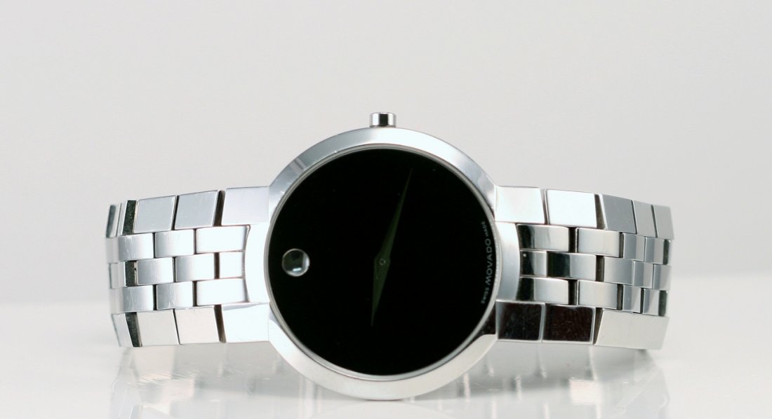 MOVADO WATCH: MOVADO STAINLESS STEEL WATCH WITH ORIGINAL BOX.