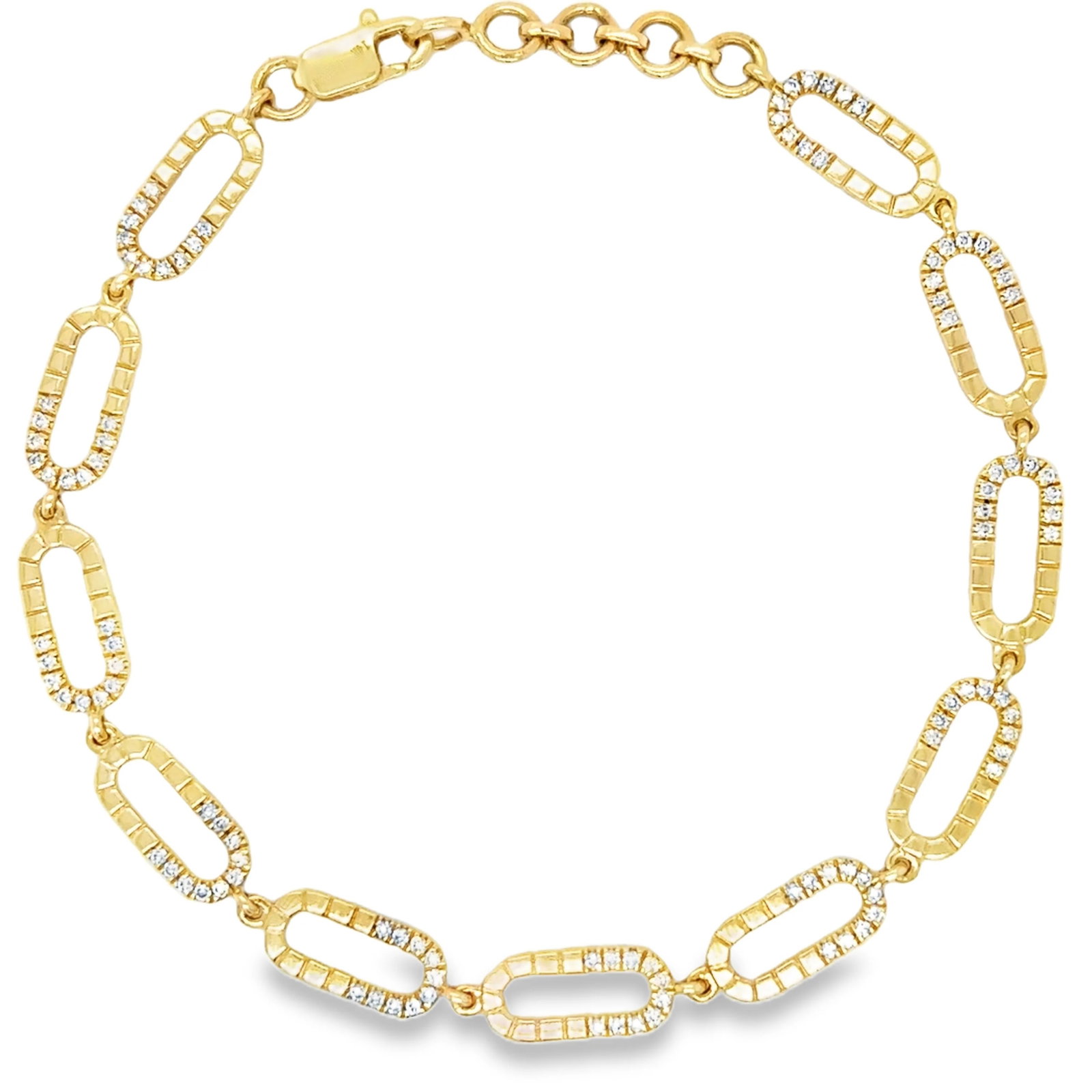 14KT GOLD HALF DIAMOND PAPERCLIP CHAIN BRACELET: 14KT YELLOW GOLD HALF DIAMOND PAPERCLIP CHAIN BRACELET14KT. GOLD WT. APPROX. 6.35 GRAMDIAMOND WT. APPROX. 1.12 CARAT / 220 PCSLENGTH: 7.5"LINK SIZE APPROX. - 5.5 MM X 16 MM
