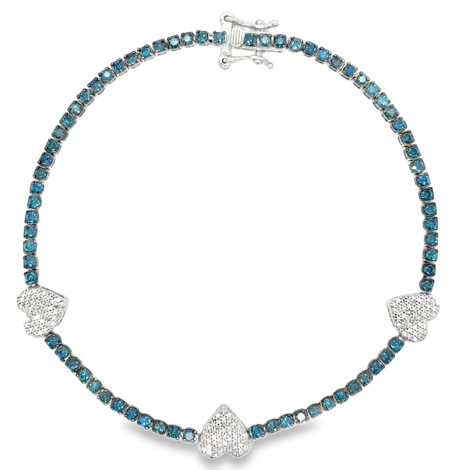 14KT GOLD BLUE DIAMONDS AND DIAMONDS HEART TENNIS BRACELET: 14KT WHITE GOLD BLUE DIAMOND AND DIAMONDS HEART TENNIS BRACELET 7"14KT GOLD WT. APPROX. 4.44 GRAMDIAMOND WT. APPROX. 0.26 CARAT / 147 PCSBLUE DIAMOND WT. APPROX. 1.44 CARAT / 72 PCS