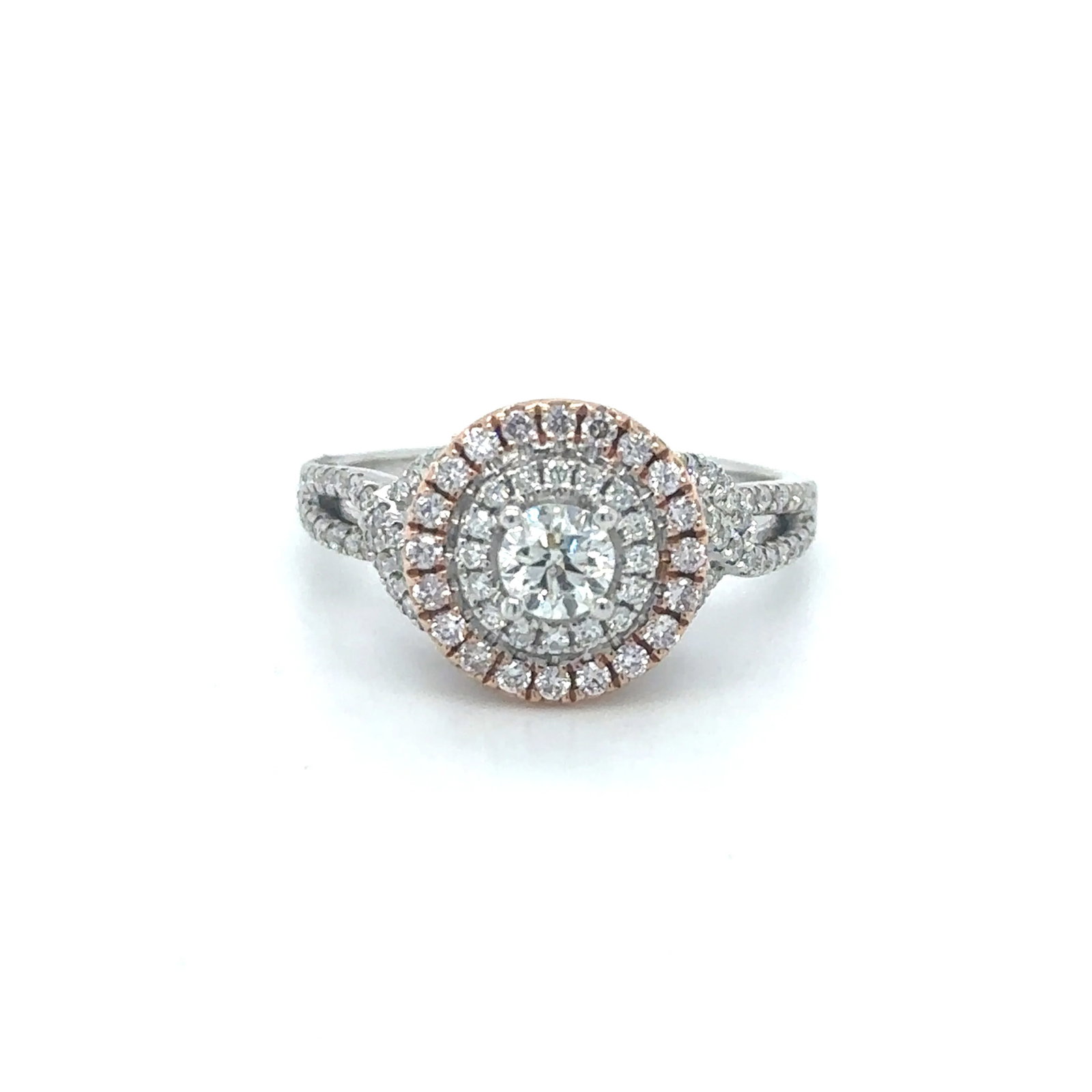 14KT GOLD TWO TONE DIAMOND RING: 14KT GOLD TWO TONE DIAMOND RING WHITE AND ROSE GOLD14KT GOLD WT. APPROX. 4.00 GRAMDIAMOND WT. APPROX. 0.68 CARATCENTRE DIAMOND WT. APPROX. 0.29 CARATSRING SIZE: 7