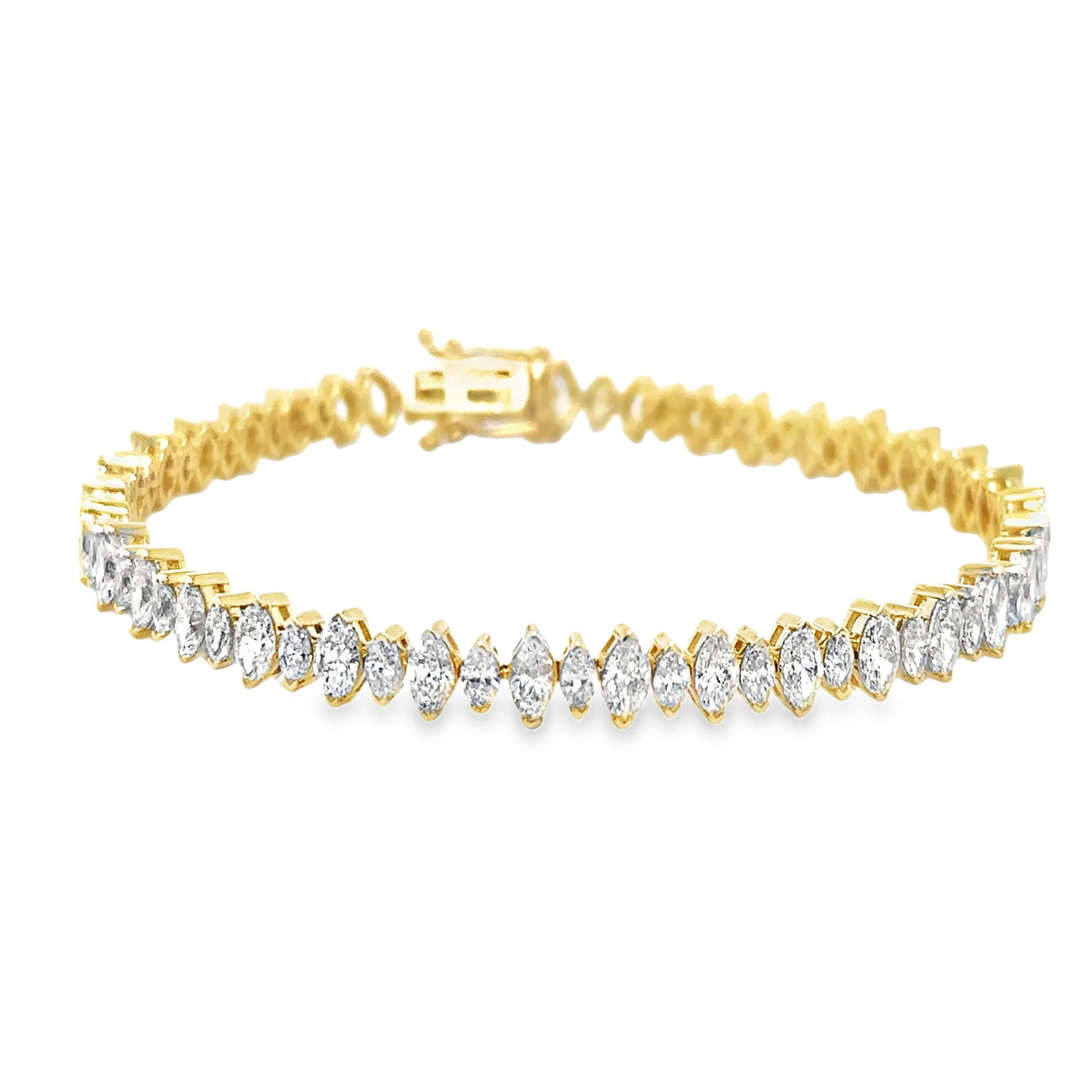 14KT YELLOW GOLD MARQUISE DIAMONDS BRACELET: 14KT YELLOW GOLD DIAMONDS BRACELET14KT GOLD WT. APPROX. 9.85 GRAMDIAMOND WT. APPROX. 6.87 CARATLENGTH: 7 INCH