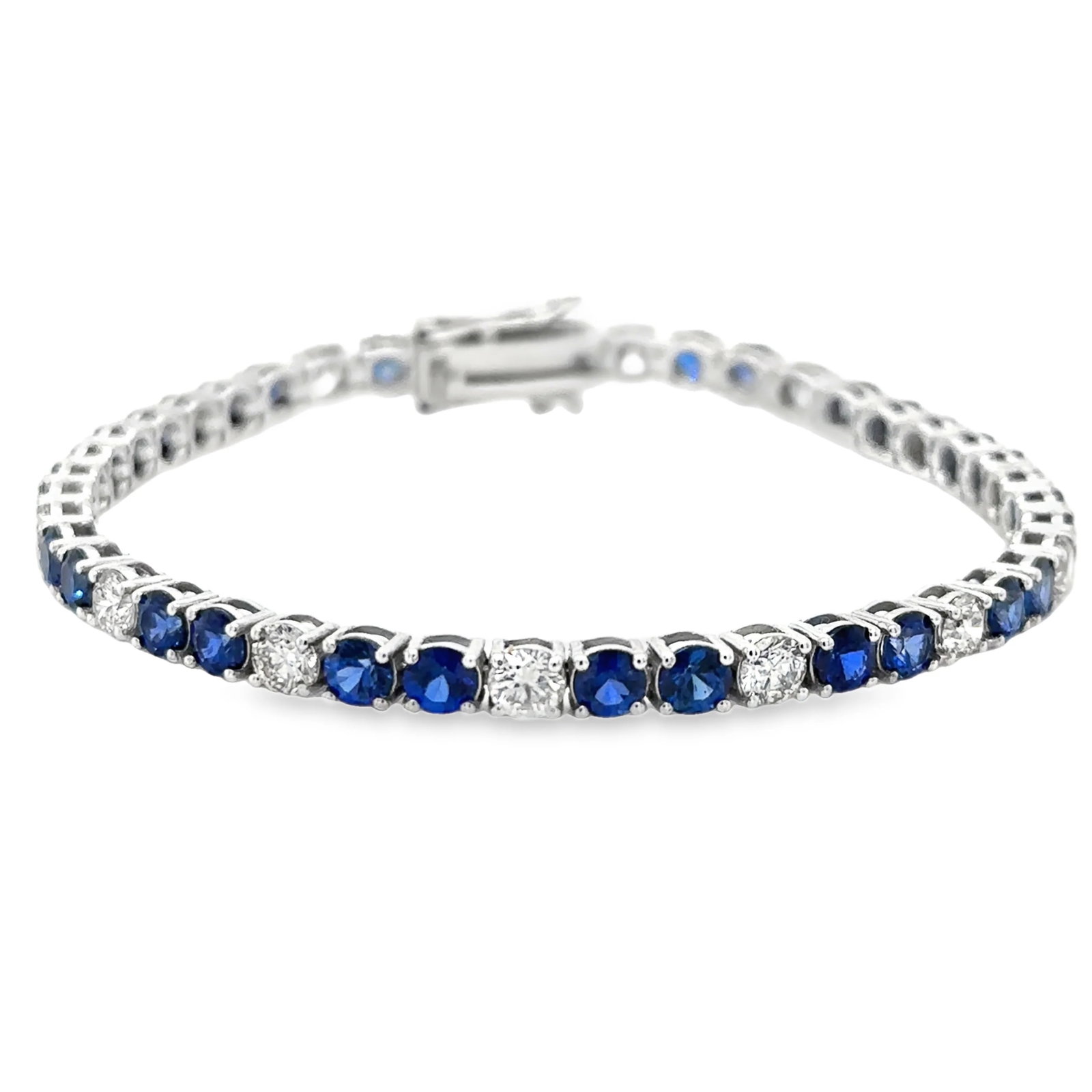 14KT GOLD DIAMOND AND BLUE SAPPHIRE BRACELET: 14KT GOLD DIAMOND AND BLUE SAPPHIRE BRACELET14KT GOLD WT. APPROX. 9.20 GRAMDIAMOND WT. APPROX. 2.90 CARAT / 14 PCSBLUE SAPPHIRE WT. APPROX. 6.90 CARAT / 29 PCSLENGTH: 7 INCHES LONG