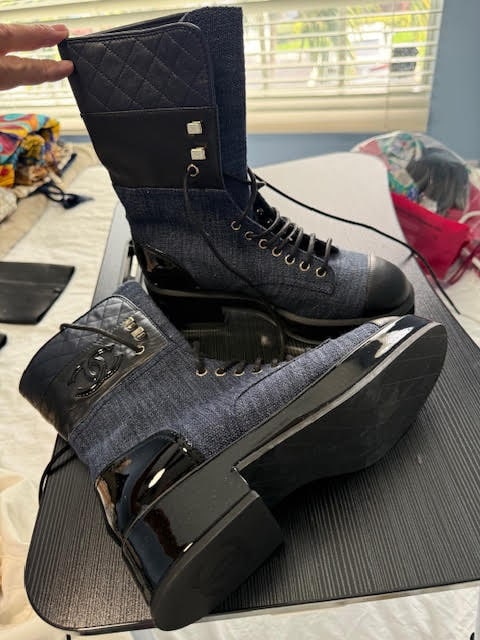 CHANEL COMBAT BOOTS: CHANEL COMBAT BOOTS Black Denim & Leather Lace-Up BootsAn effortlessly chic and highly sought-after pair of Chanel combat boots featuring a luxurious mix of textured black denim canvas and signature b
